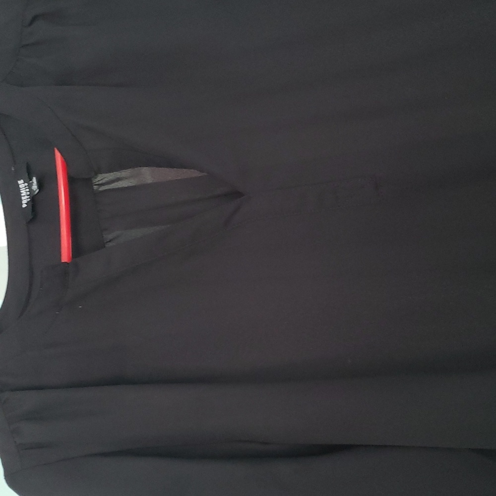 A black Premise Studio blouse.